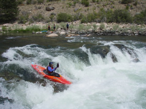 Kayaking a rapid on the Middle Fork